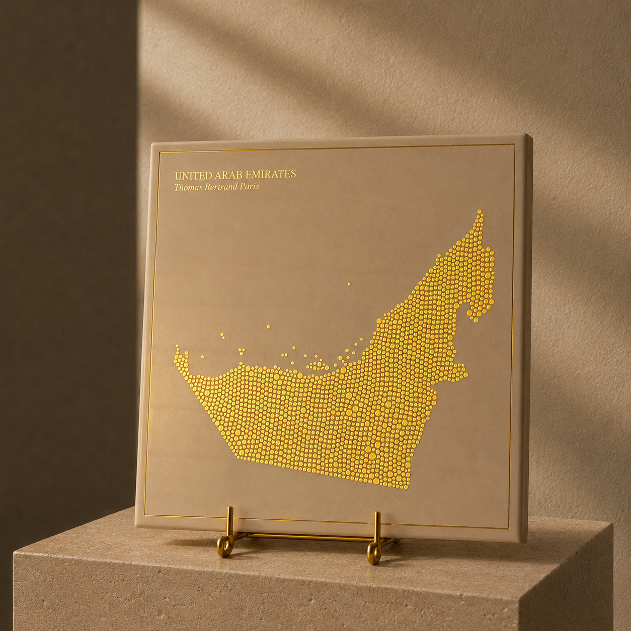 Ceramic tile - United Arab Emirates in gold with inscription / Thomas Bertrand Paris