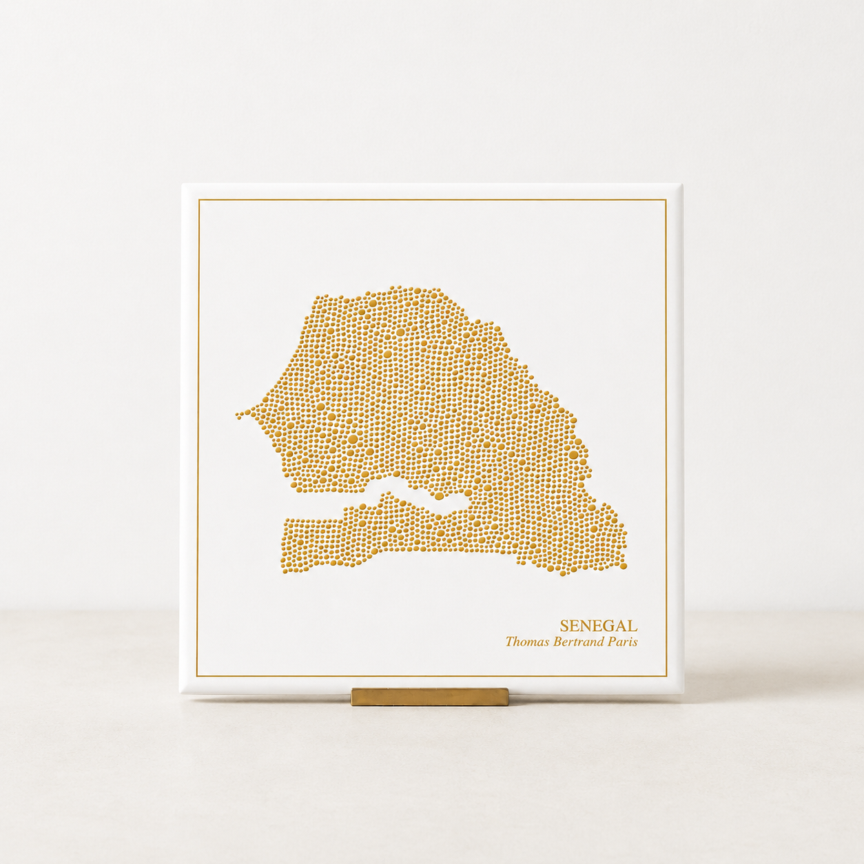 Ceramic tile - Senegal in gold with inscription / Thomas Bertrand Paris